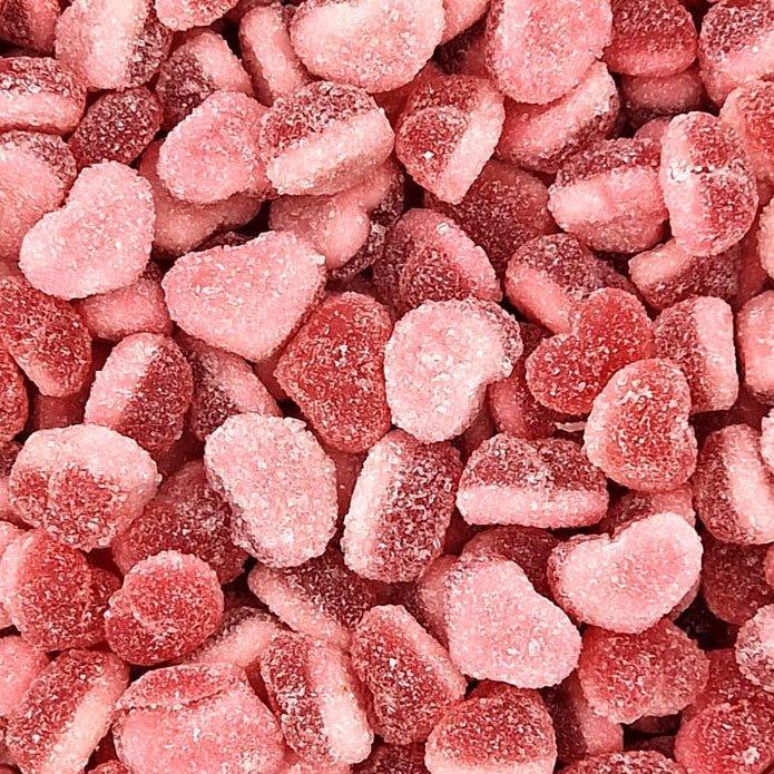 Gummy Galaxy Sour Strawberry Hearts in a clear container, showing bright red, heart-shaped fizzy sweets with a glossy finish.