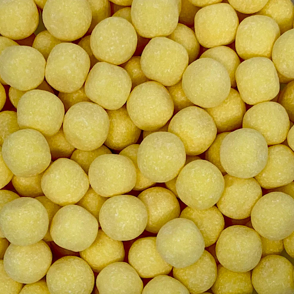 Gummy Galaxy Lemon Bonbon chewy sweets in bright yellow lemon flavor, with a glossy, smooth surface and fruity appearance.