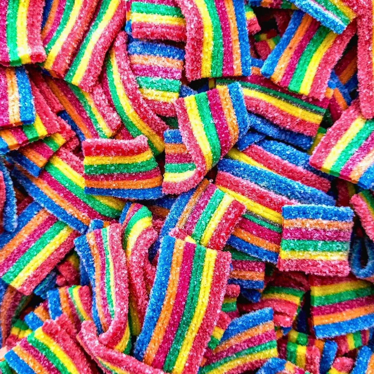 Gummy Galaxy Astro Rainbow Belts fizzy sweets in vibrant rainbow colors, chewy candy with a glossy finish.