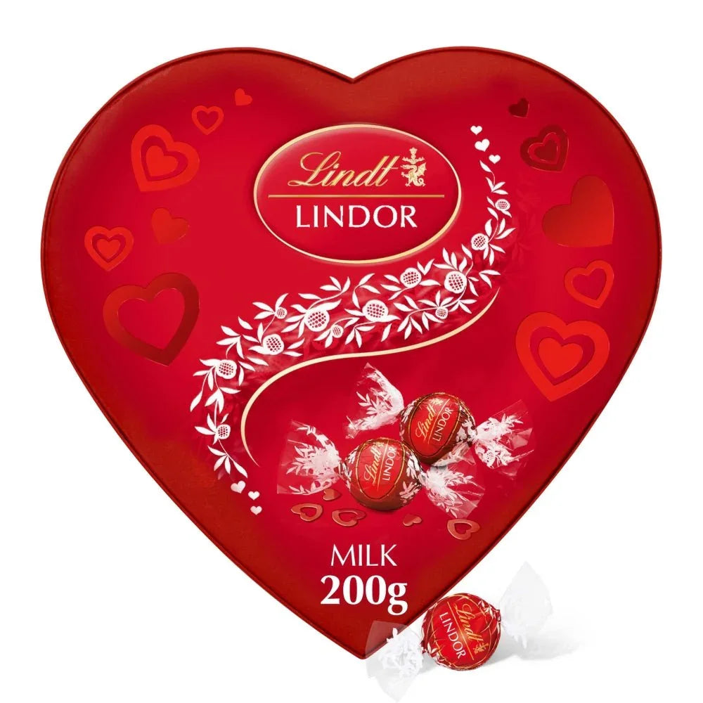 Lindt Lindor Milk Chocolate Heart Gift Box by Gummy Galaxy, 200g, featuring smooth milk chocolates in a decorative heart-shaped box.